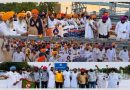 Rights groups hold ‘Torch March’ at Harike; Seek memorial and justice in Jaswant Singh Khalra case