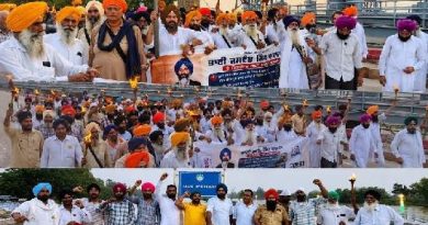 Rights groups hold ‘Torch March’ at Harike; Seek memorial and justice in Jaswant Singh Khalra case