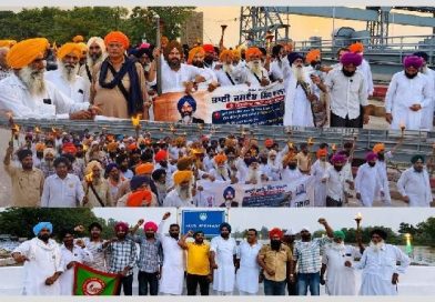 Rights groups hold ‘Torch March’ at Harike; Seek memorial and justice in Jaswant Singh Khalra case